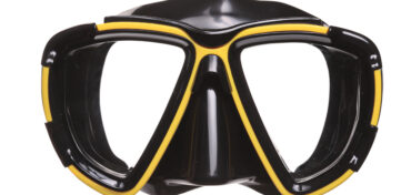 Reliable Guide to finding the best SCUBA Mask in 2023 1 Scuba diver swimming near tropical reef, Raleigh advanced diving class inspiration